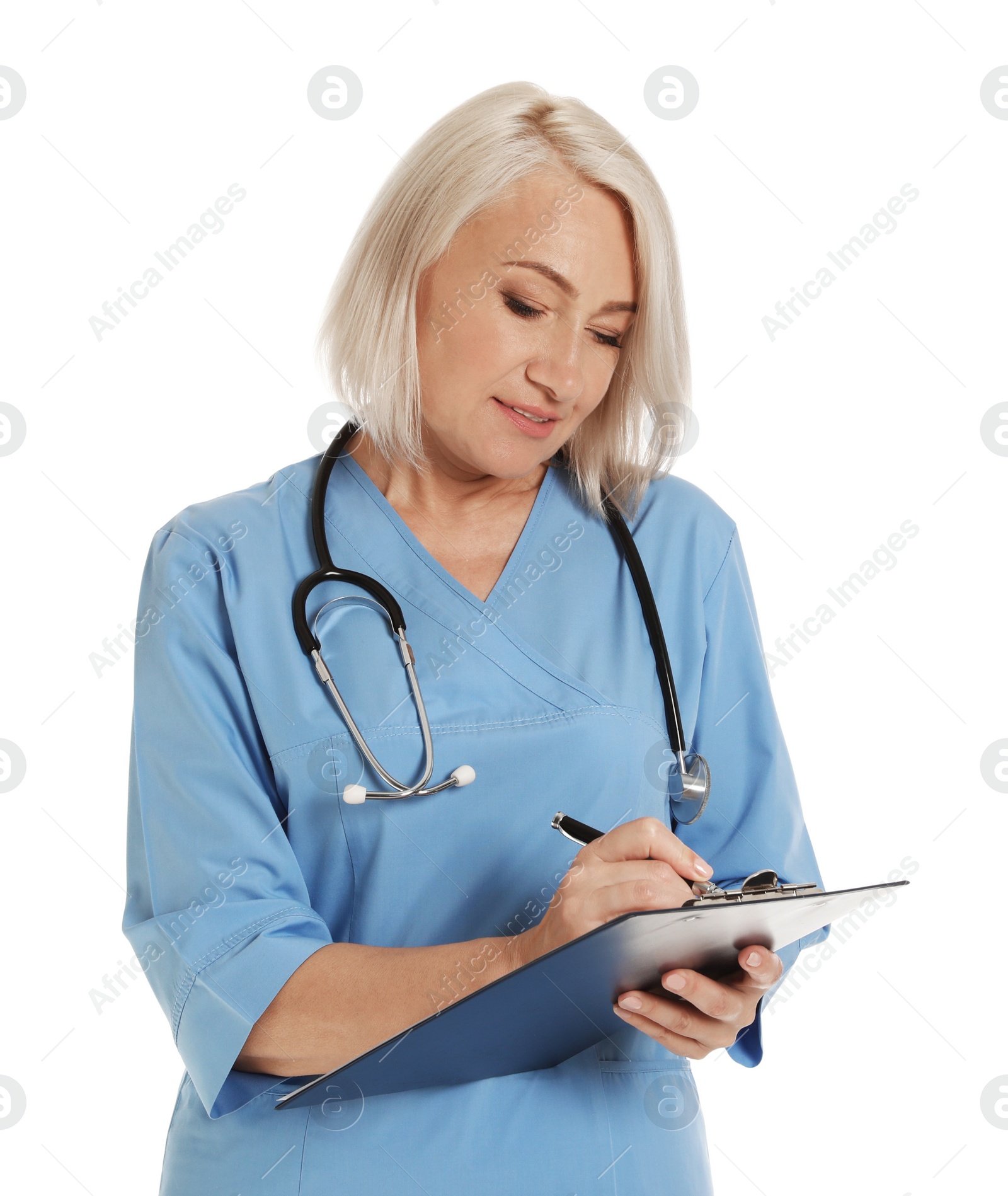 Photo of Portrait of female doctor in scrubs with clipboard isolated on white. Medical staff