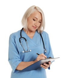 Photo of Portrait of female doctor in scrubs with clipboard isolated on white. Medical staff