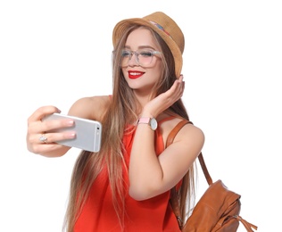 Photo of Attractive young woman taking selfie on white background