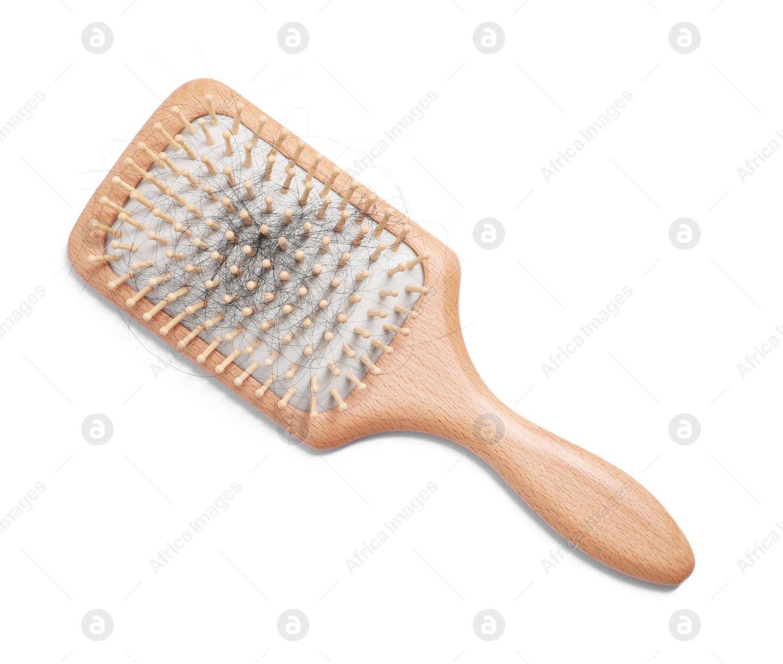 Photo of Wooden brush with lost hair on white background, top view