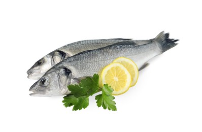 Photo of Fresh sea bass fish, lemon and parsley on white background