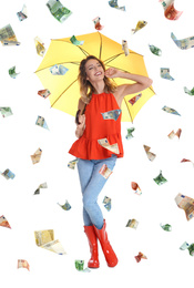Woman with yellow umbrella under money rain on white background 