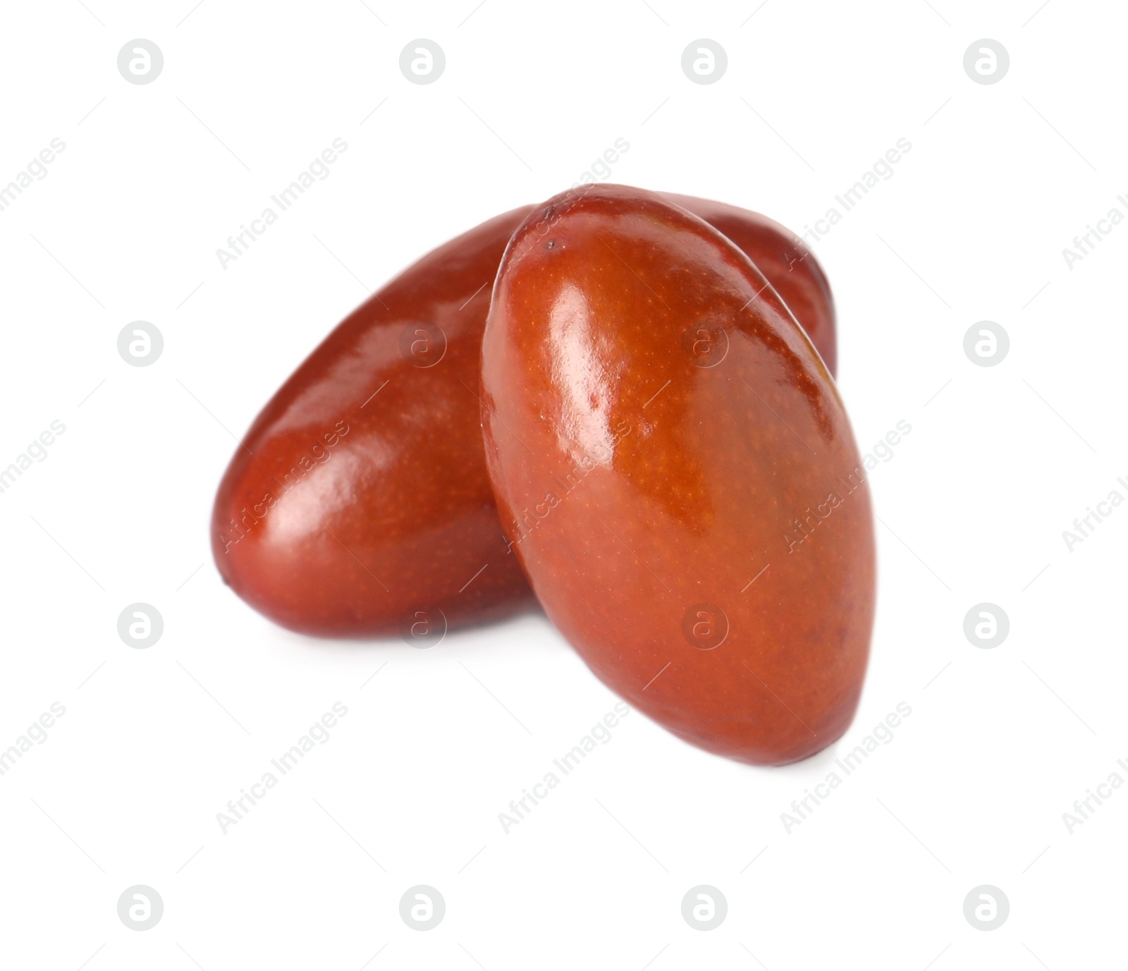 Photo of Two ripe red dates on white background