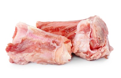 Photo of Raw chopped meaty bones on white background