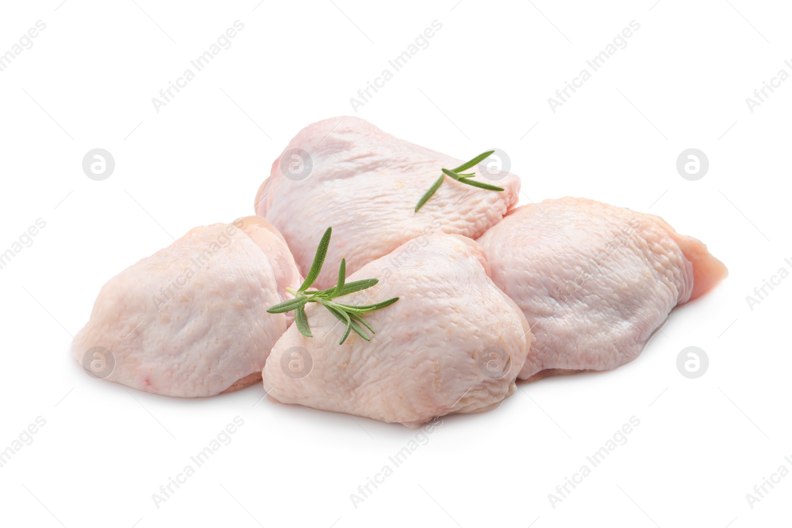 Photo of Raw chicken thighs with rosemary on white background