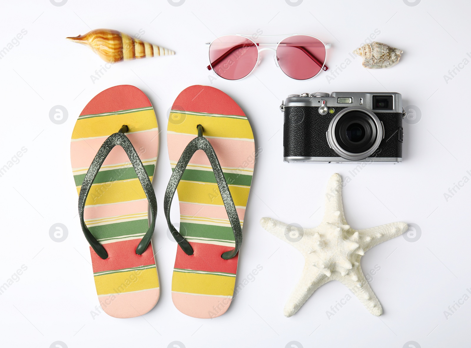 Photo of Flat lay composition with different beach objects on white background