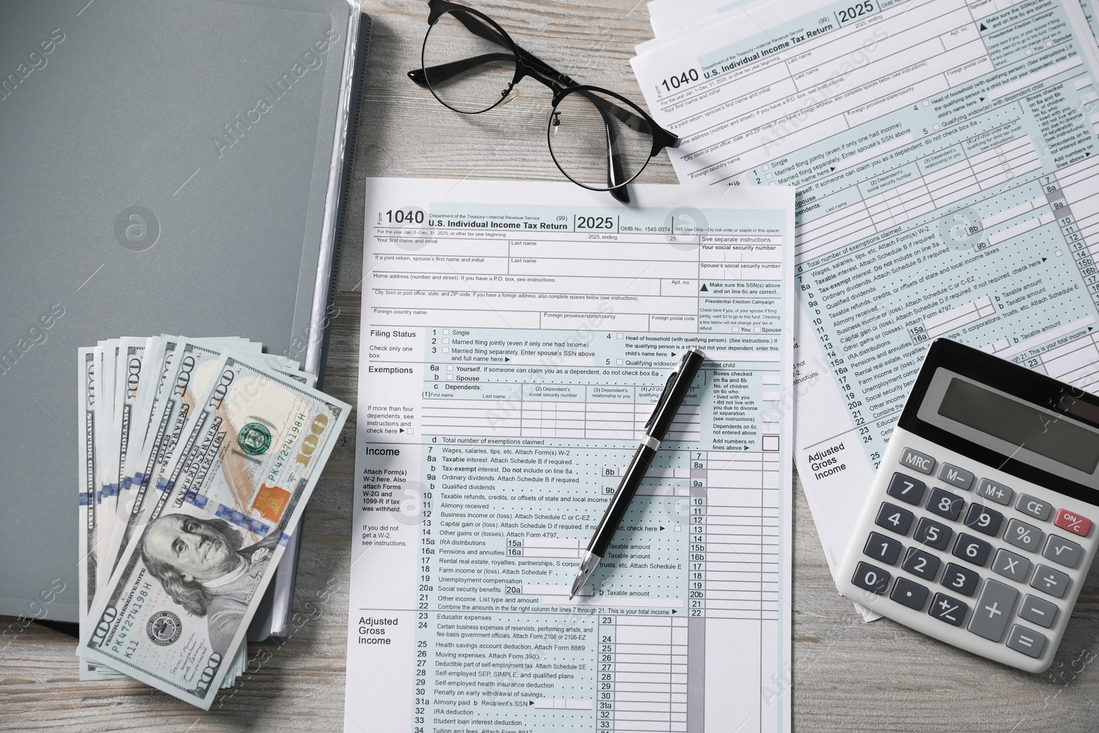 Photo of Payroll. Flat lay composition with tax return forms on wooden table