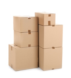 Photo of Cardboard boxes on white background. Moving day