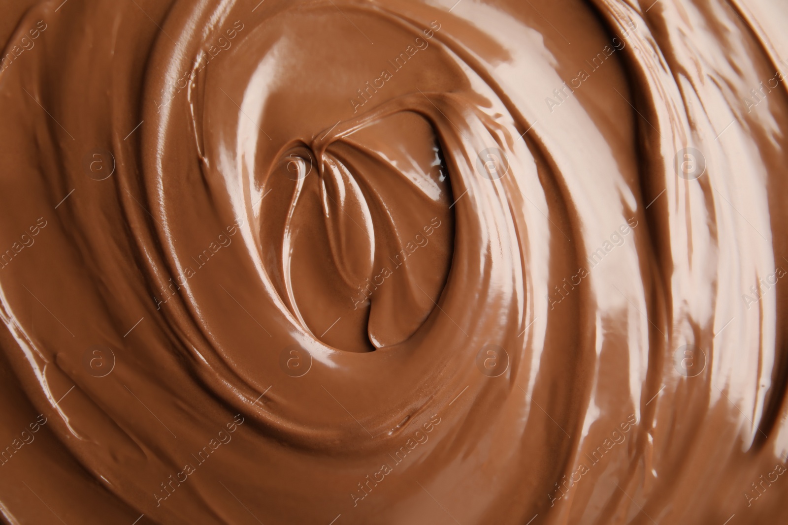 Photo of Sweet tasty chocolate cream as background, closeup