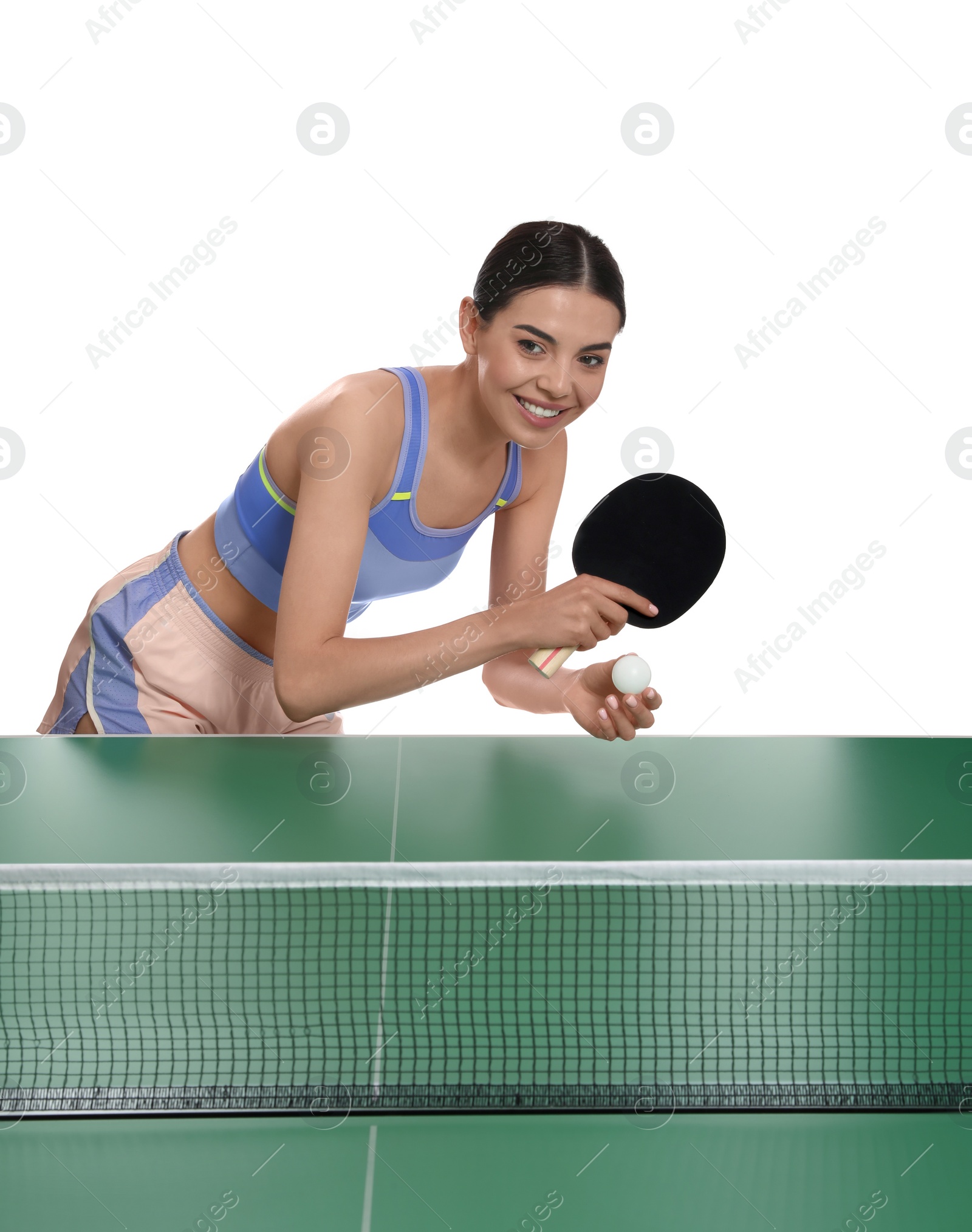 Photo of Beautiful young woman playing ping pong on white background