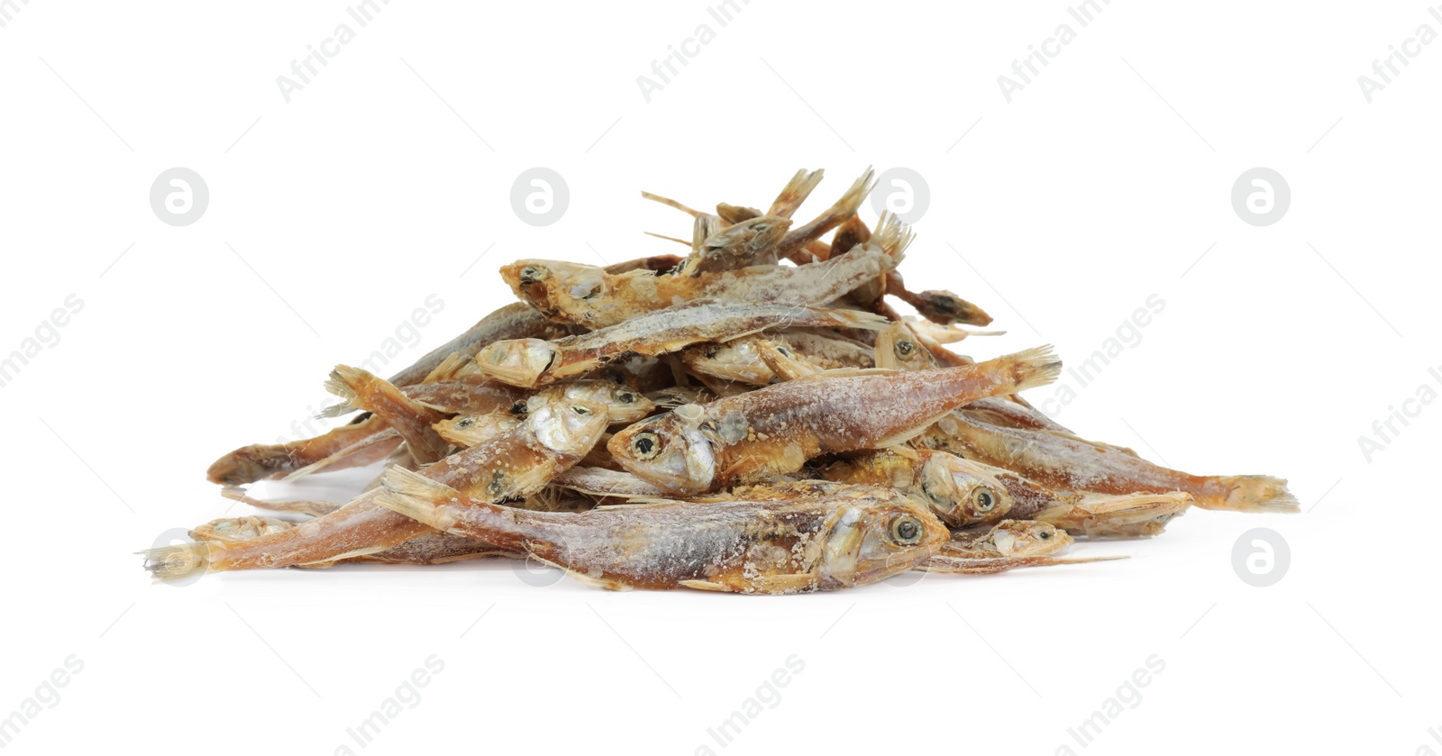 Photo of Delicious dried salted anchovies on white background