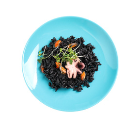 Delicious black risotto with seafood isolated on white, top view