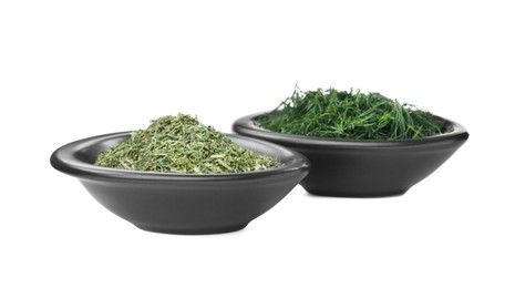 Photo of Bowls with aromatic dry and fresh dill on white background