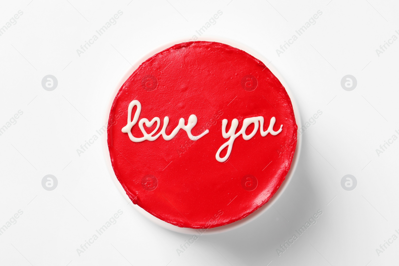 Photo of Bento cake with text Love You on white table, top view. St. Valentine's day surprise