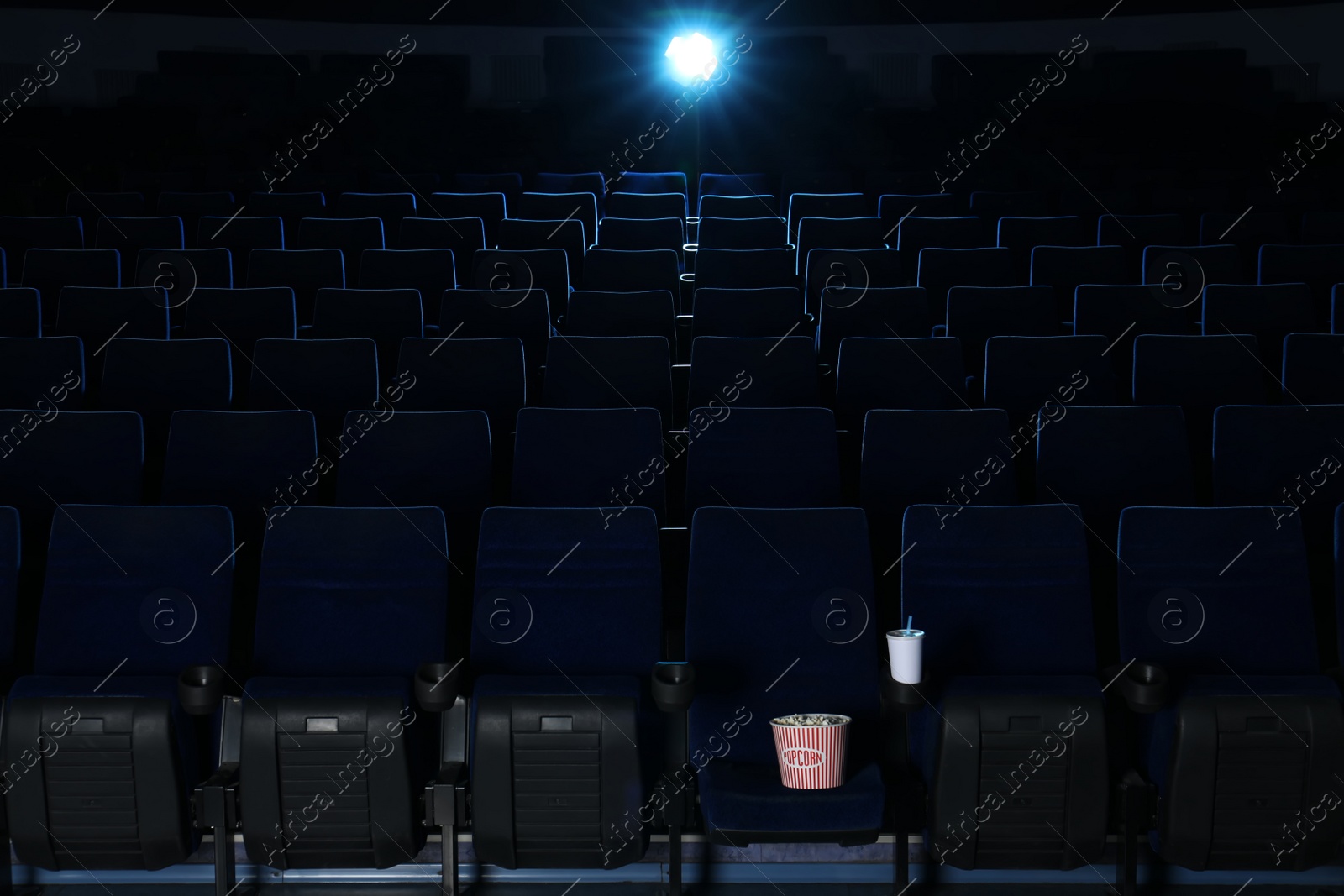 Photo of View of empty cinema with comfortable chairs