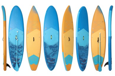 Image of Collage with SUP boards with paddle isolated on white, different sides