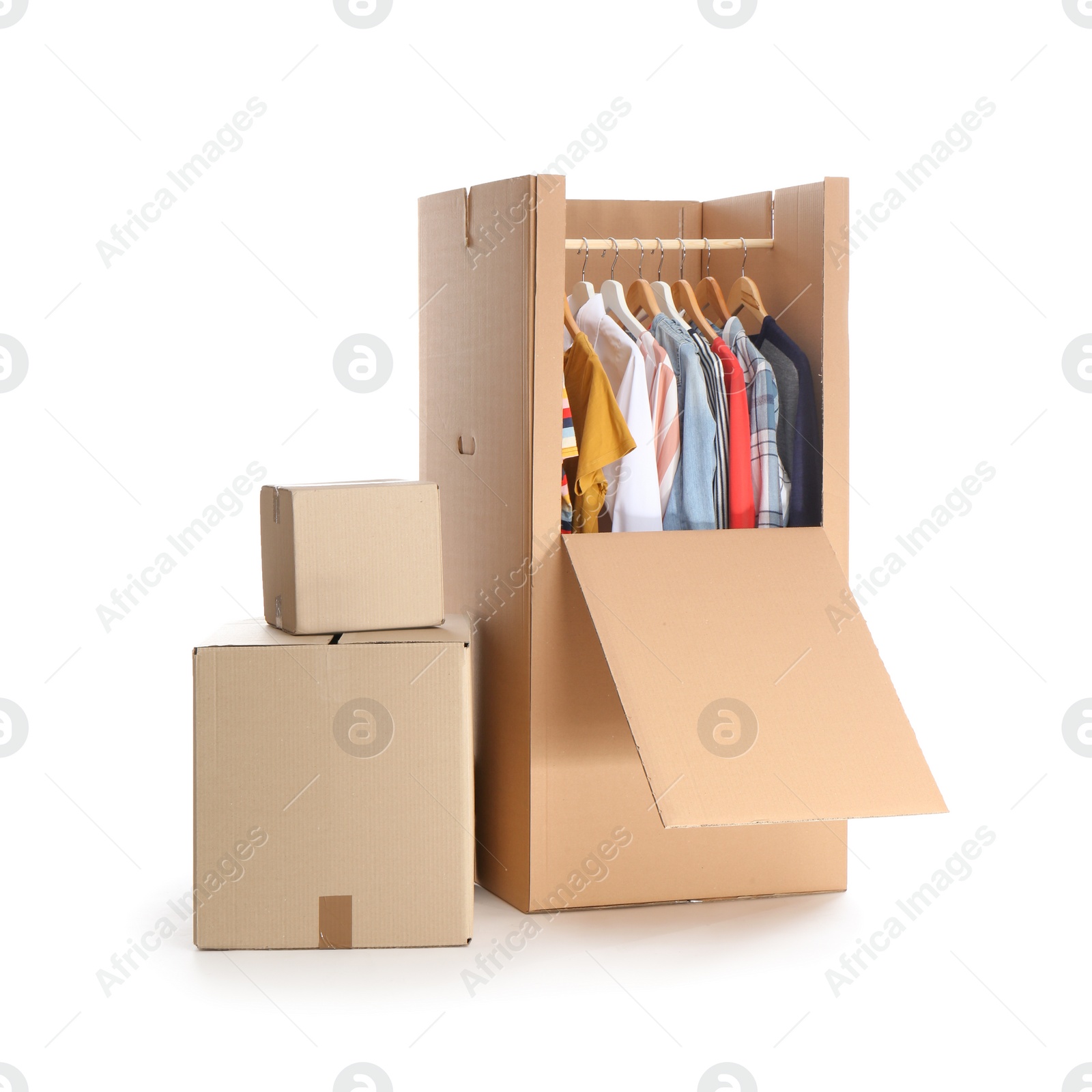 Photo of Cardboard wardrobe box with clothes on white background