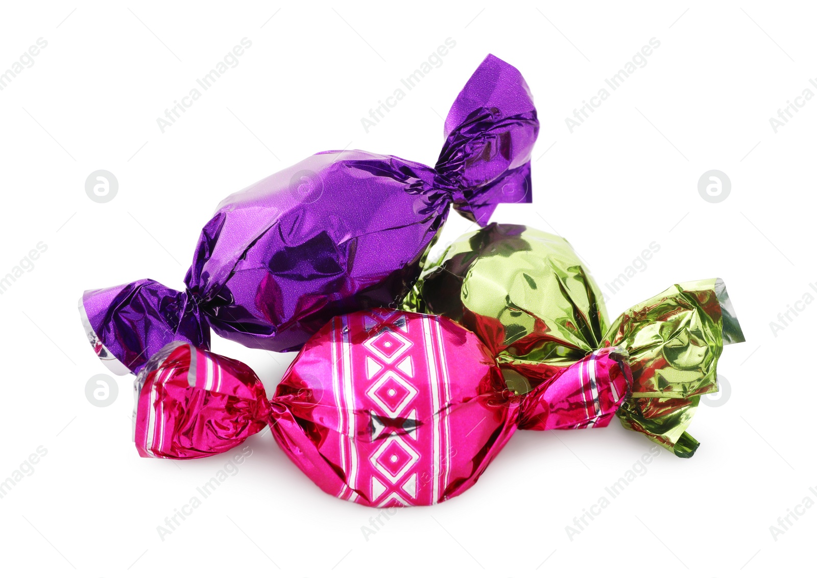 Photo of Sweet candies in colorful wrappers on white background