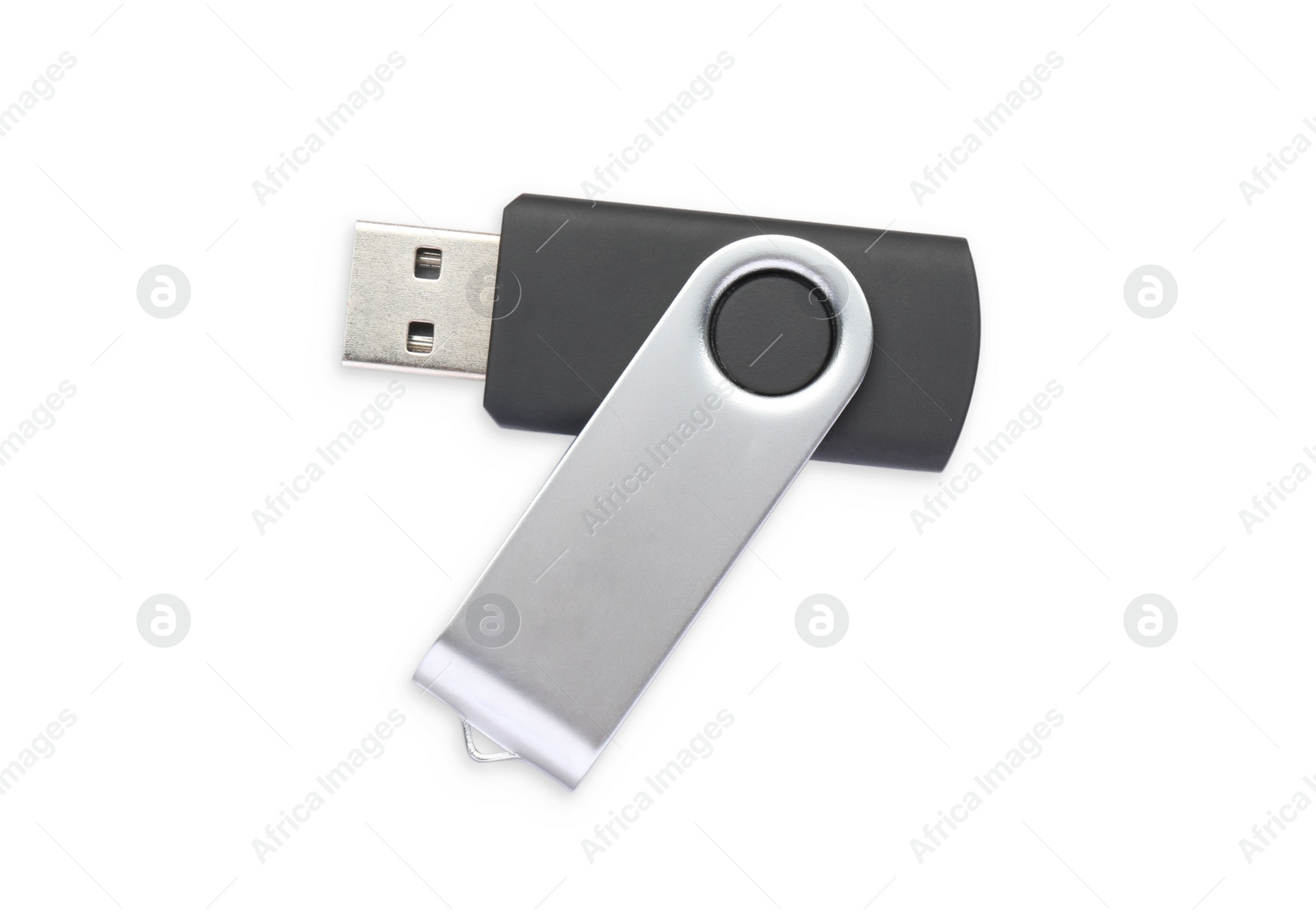 Photo of Modern usb flash drive isolated on white, top view