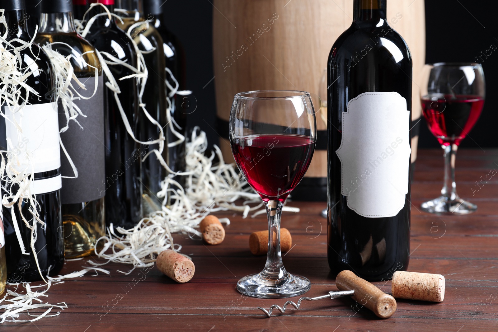 Photo of Composition with delicious red wine on wooden table