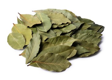 Pile of aromatic bay leaves on white background