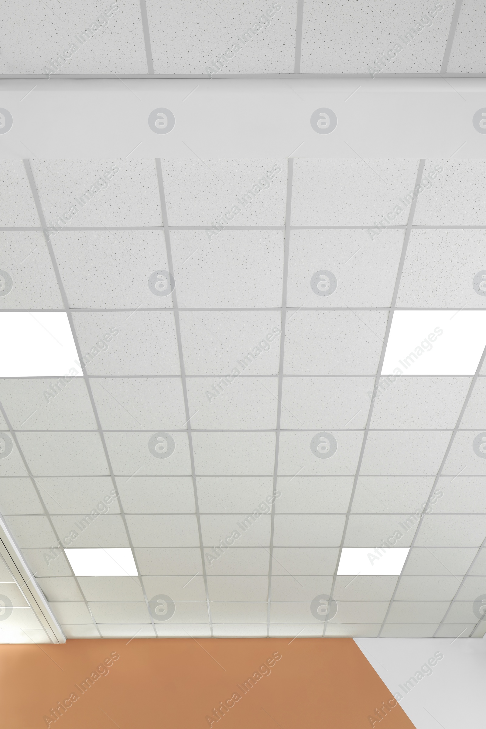 Photo of White ceiling in office room. Interior design