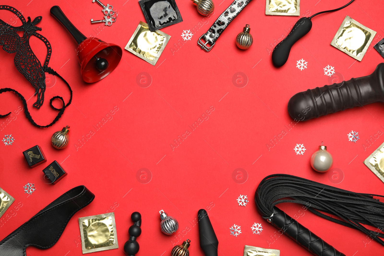 Photo of Flat lay composition with different sex toys on red background. Space for text