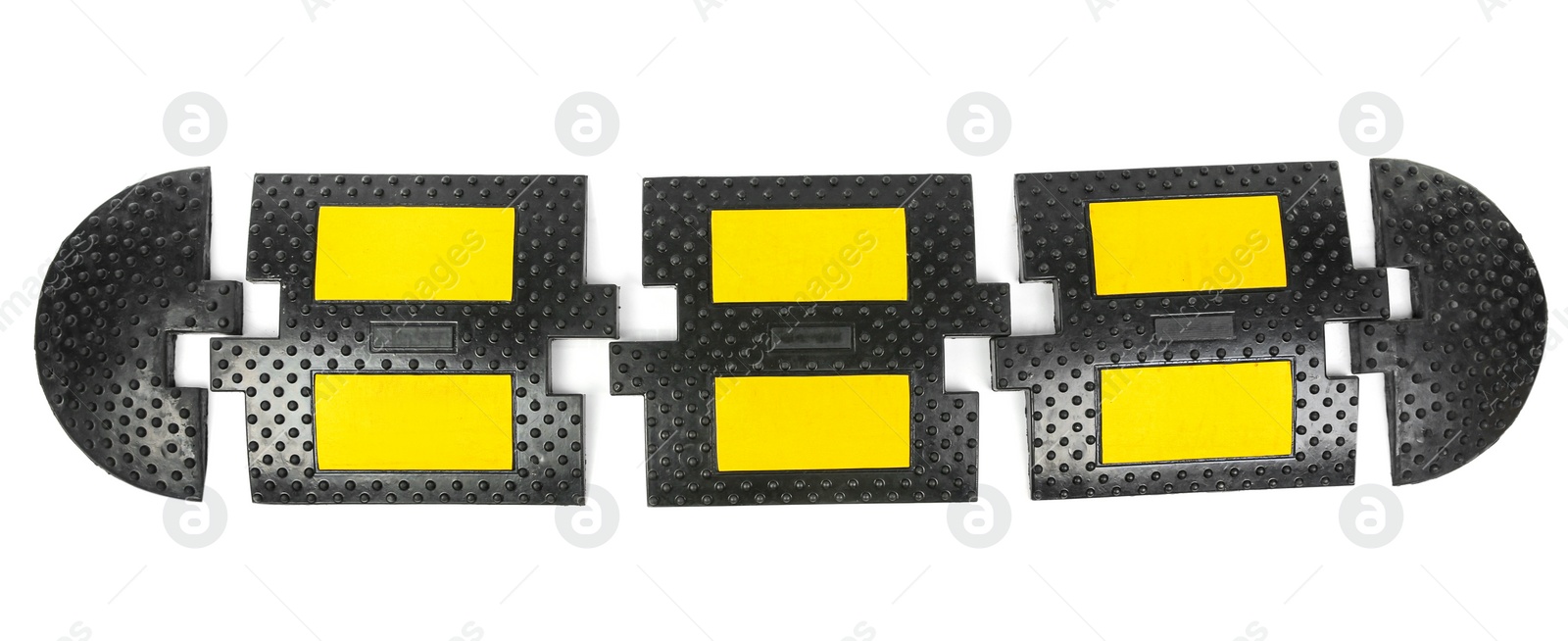 Photo of Parts of speed bump isolated on white, top view