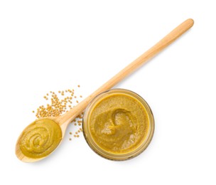Photo of Fresh tasty mustard sauce in jar, spoon and dry seeds isolated on white, top view