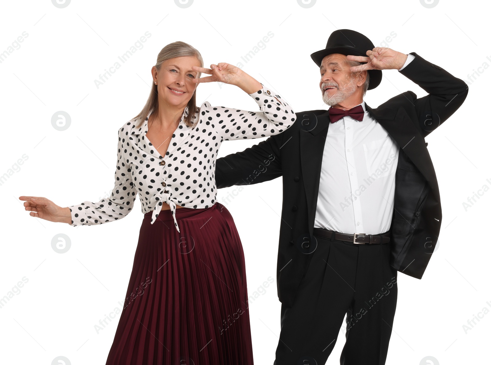 Photo of Senior couple dancing together on white background