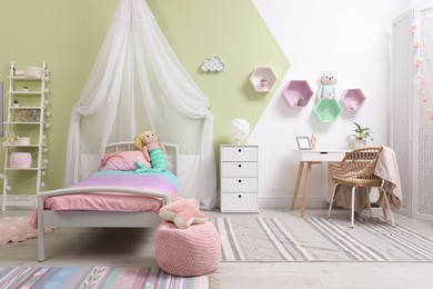 Cute child's room interior with toys and modern furniture