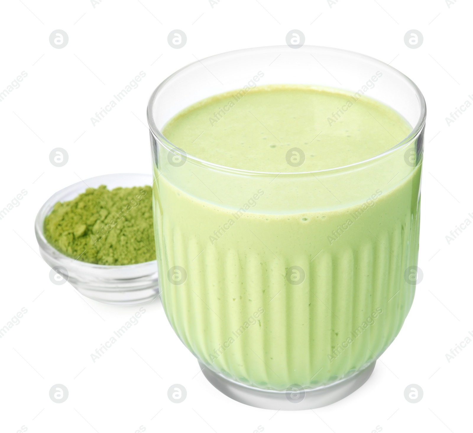 Photo of Glass of tasty matcha smoothie and powder isolated on white