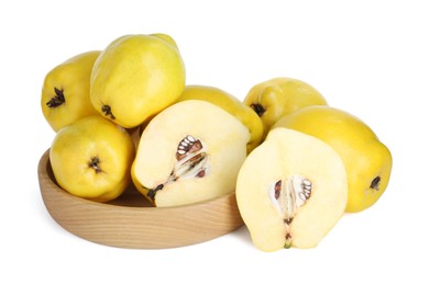 Photo of Ripe whole and cut quinces isolated on white