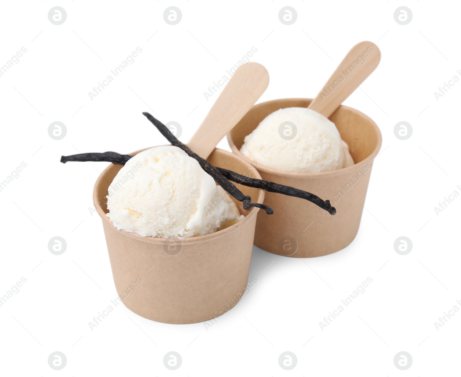 Photo of Paper cups with delicious ice cream and vanilla pods isolated on white