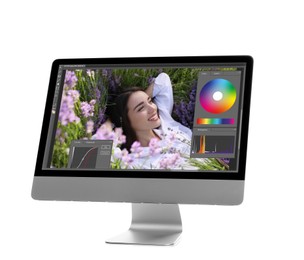 Image of Computer with photo editor application isolated on white