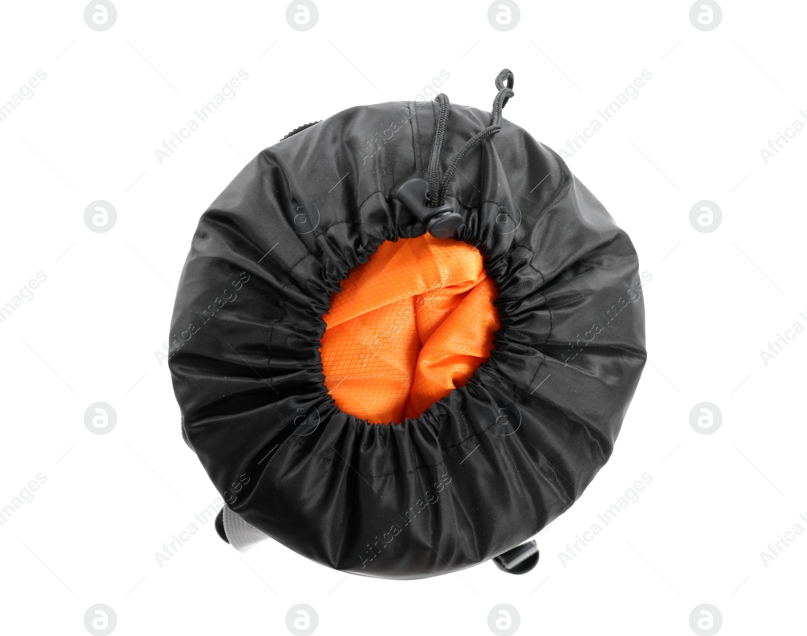 Photo of Rolled sleeping bag on white background, top view. Camping equipment