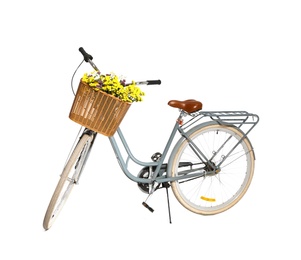 Photo of Retro bicycle with wicker basket on white background