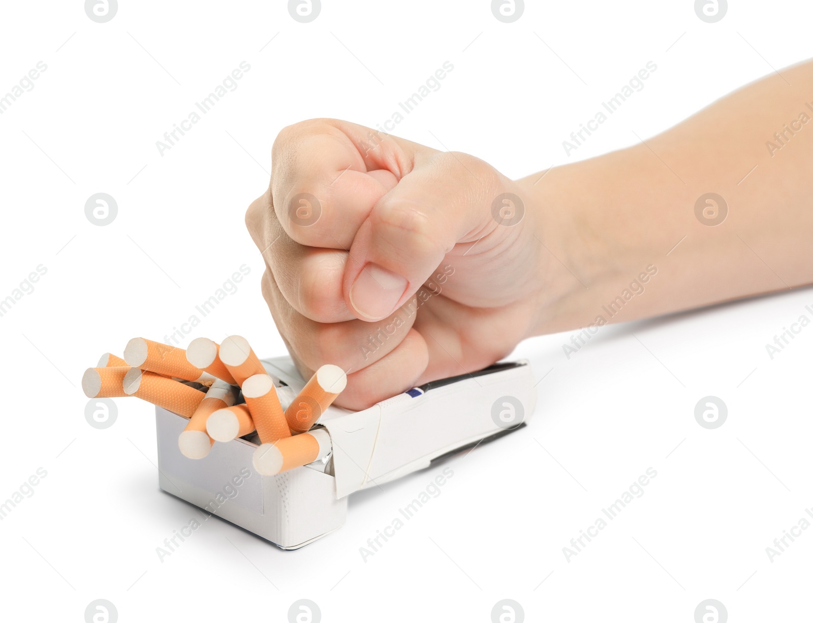 Photo of Stop smoking. Man crushing pack with cigarettes on white background, closeup