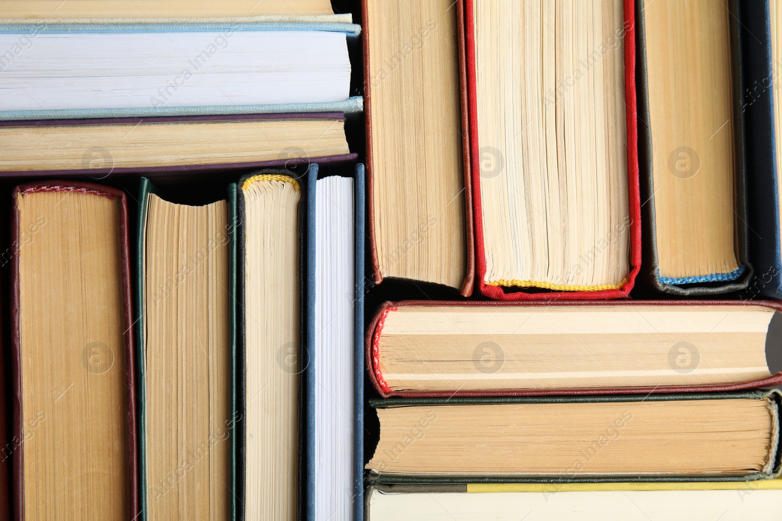 Photo of Many different hardcover books as background, top view