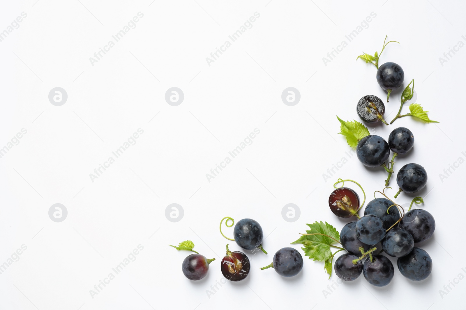 Photo of Fresh ripe juicy grapes on white background, top view