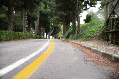 Beautiful view of asphalt road with pedestrian area in city