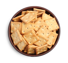 Tasty crackers in bowl isolated on white, top view