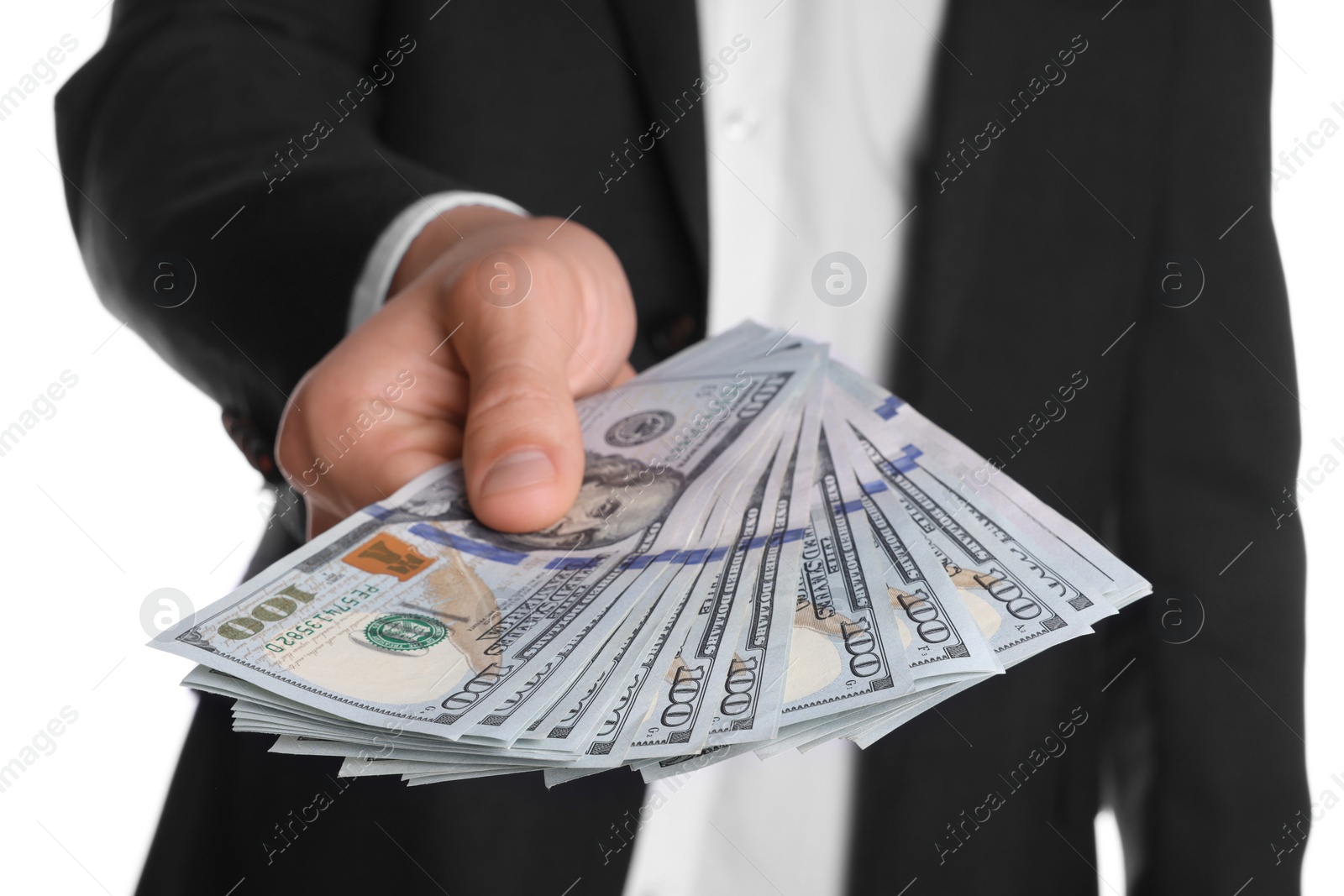 Photo of Money exchange. Man holding dollar banknotes on white background, closeup