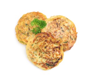 Photo of Delicious zucchini fritters with curly parsley on white background, top view
