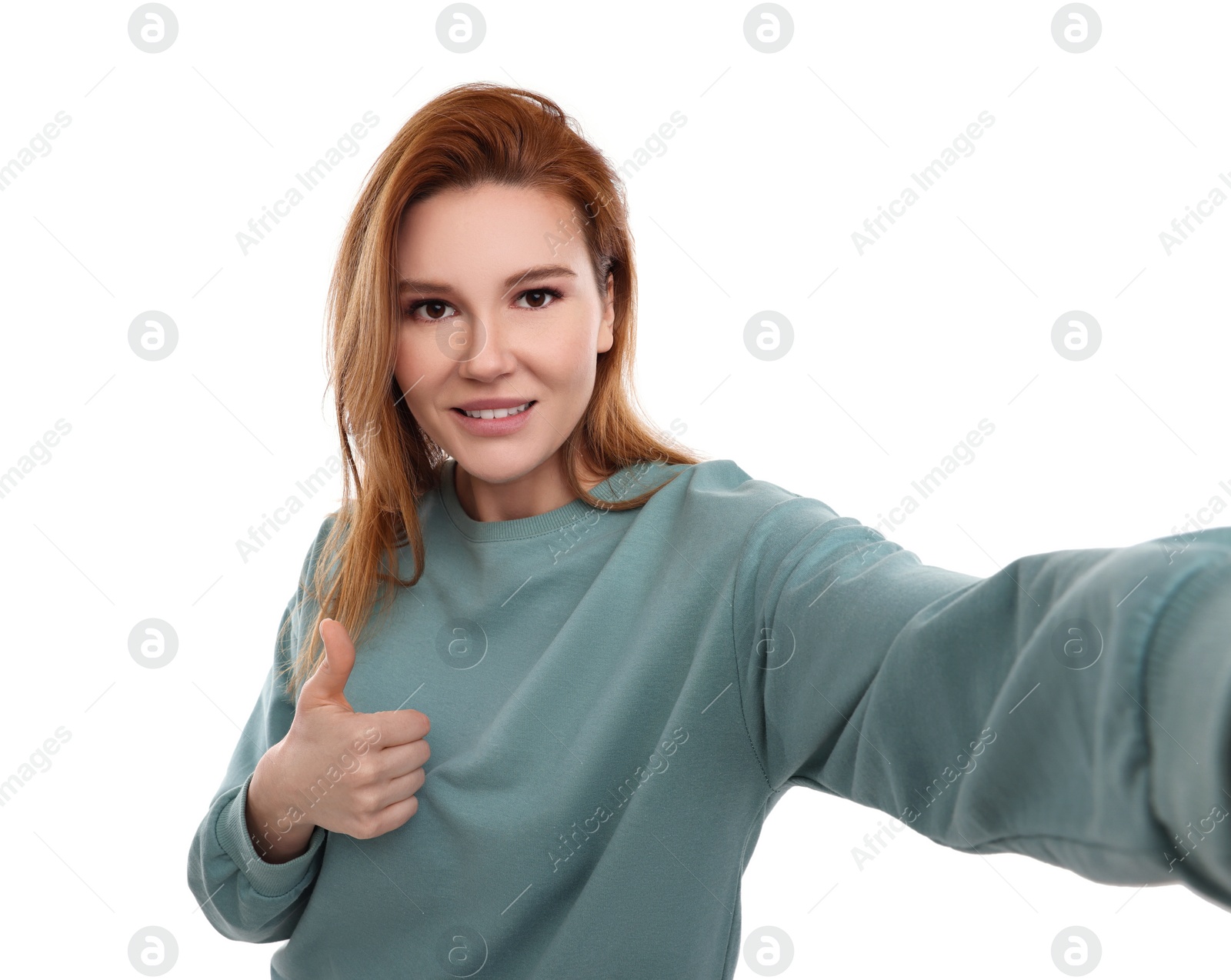 Photo of Beautiful woman taking selfie on white background