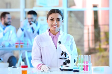 Young scientist working in laboratory. Chemical analysis