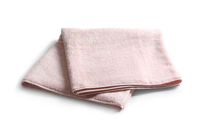 Photo of Folded soft terry towel on white background