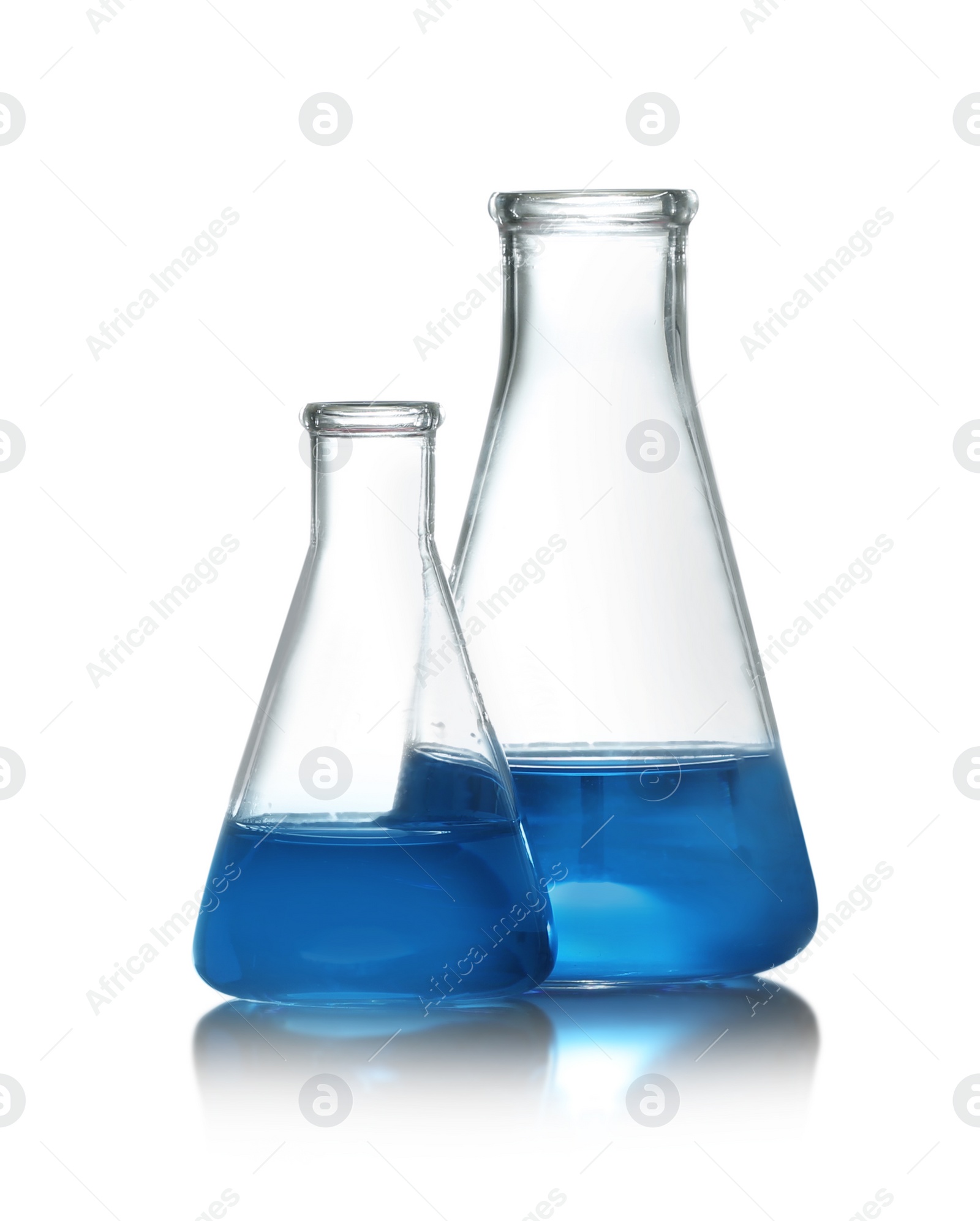 Photo of Conical flasks with liquid samples on white background. Chemistry glassware