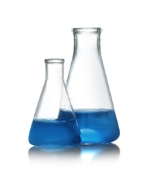 Conical flasks with liquid samples on white background. Chemistry glassware