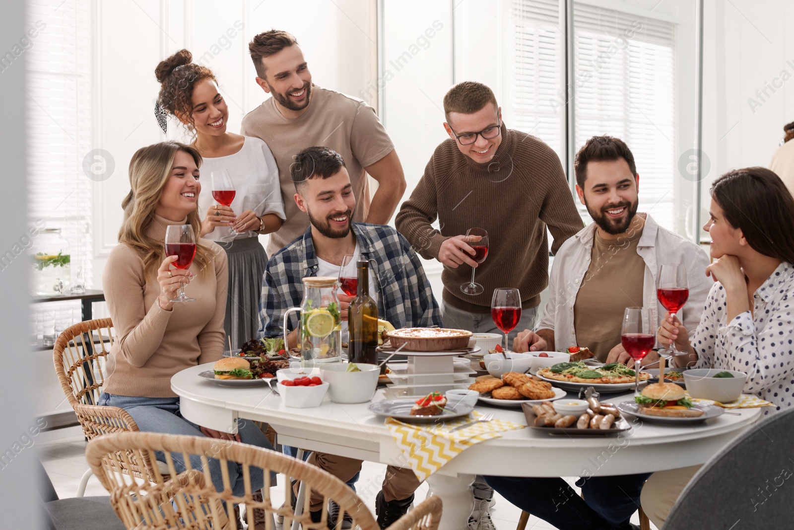 Photo of Group of people having brunch together indoors